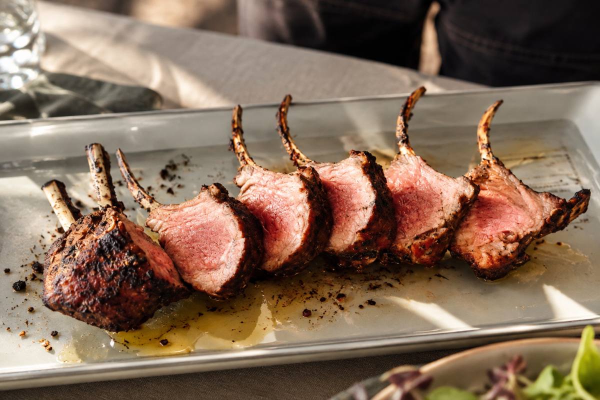 Rack of lamb roasted pink and cut into chops: main course for boardroom dining in Zürich