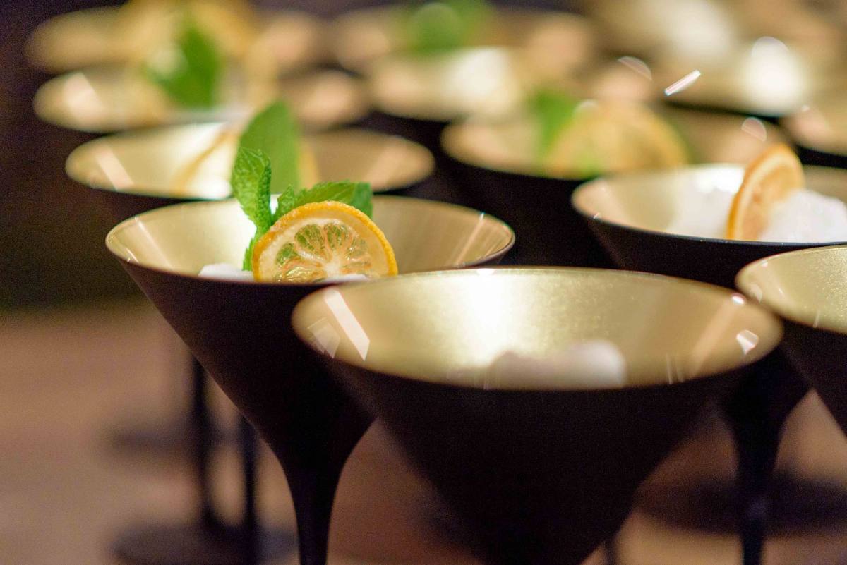Lemon sorbet with mint and candied lemon in gold coupes: dessert for boardroom dining in Zürich